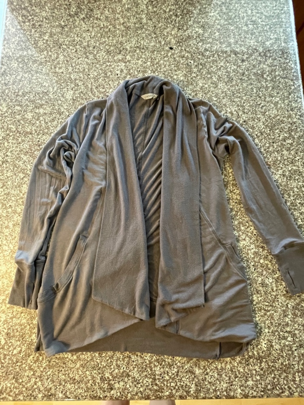 Athleta Pranayama wrap  size Medium  Gray color  Thumb holes  Pockets